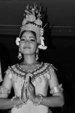Dressed in traditional Cambodian dance attire, this girl performs for tourists at a bar in Siem Reap.
